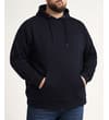 Thumbnail Navy pullover hoody worn with hands in pocket.