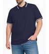 Thumbnail Model wearing a navy polo shirt with tipped collar and cuffs.