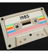 Thumbnail Close-up of 1985 cassette graphic on black T-shirt.