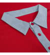 Thumbnail Close-up of chambray collar and button placket on red polo.