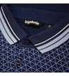 Thumbnail Close-up of collar and button placket on navy geometric polo.