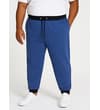Thumbnail Model wearing deep blue contrast joggers, straight-on view.