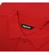 Thumbnail Close-up of the collar and top placket on the red polo.