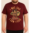 Thumbnail Model wearing the burgundy graphic T-shirt, front view.