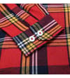 Thumbnail Close-up of the buttoned cuff on the red check shirt.