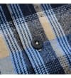Thumbnail Close-up of front button placket on blue checked flannel.