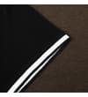Thumbnail Close-up of black sleeve cuff with white tipped stripes.