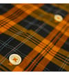 Thumbnail Close-up of orange and black check fabric and buttons.