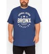 Thumbnail Model wearing indigo Bronx print tall T-shirt, front view.