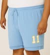 Thumbnail Blue basketball shorts worn on model, front view with 11.