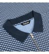 Thumbnail Close-up of navy polo collar and zip opening.