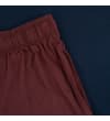 Thumbnail Close-up of burgundy shorts side pocket and waistband.