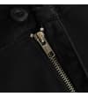 Thumbnail Close-up of black shorts zip fly and button fastening.