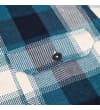 Thumbnail Close-up of chest pocket flap on teal check overshirt.