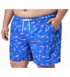 Thumbnail Model wearing royal blue flamingo print swim shorts.