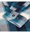 Thumbnail Close-up of buttoned cuff on teal check overshirt.