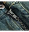 Thumbnail Zip fly close-up on vintage wash denim jeans.