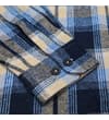 Thumbnail Close-up of buttoned cuff on navy checked flannel shirt.