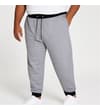 Thumbnail Close-up of grey marl sweatpants on model, showing drawstring.