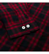 Thumbnail Close-up of the cuff with white buttons on the checked shirt.