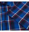 Thumbnail Close-up of blue check shirt sleeve and chest pocket.