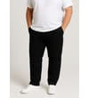 Thumbnail Black chino pants worn with hands in front pockets.
