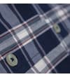 Thumbnail Angled close-up of navy check shirt placket and button.