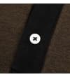Thumbnail Close-up of white button on black placket and brown fabric.