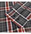 Thumbnail Close-up of the buttoned cuff on the checked shirt.