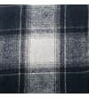 Thumbnail Close-up of the grey and black check pattern fabric.