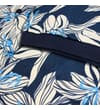 Thumbnail Close-up of navy floral polo sleeve and cuff trim.