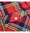 Thumbnail Close-up of chest pocket flap with button on checked flannel.