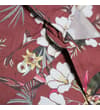 Thumbnail Close-up of button placket and collar on floral shirt.