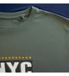 Thumbnail Close-up of sage green crew neck and upper chest print.