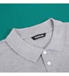 Thumbnail Close-up of grey polo collar and two-button placket.