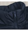 Thumbnail Close-up of the navy padded vest stand collar and zip.