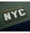 Thumbnail Close-up of NYC chest print on sage green T-shirt.