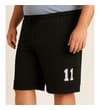 Thumbnail Black basketball shorts worn in angled front view.