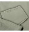 Thumbnail Close-up of the rear patch pocket on olive shorts.
