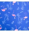 Thumbnail Close-up of flamingo, palm tree and fruit print on blue fabric.