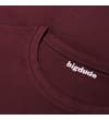 Thumbnail Close-up of the burgundy crew neck collar.