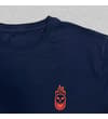 Thumbnail Close-up of crew neck and flaming skull logo on front.