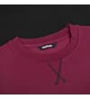 Thumbnail Close-up of crew neck with crossed stitch detail on burgundy panel.