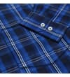 Thumbnail Close-up of blue checked shirt cuff with two white buttons.