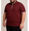Thumbnail Burgundy polo shirt worn on model from a slight side angle.