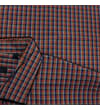 Thumbnail Close-up of brown and blue check shirt collar and sleeve.