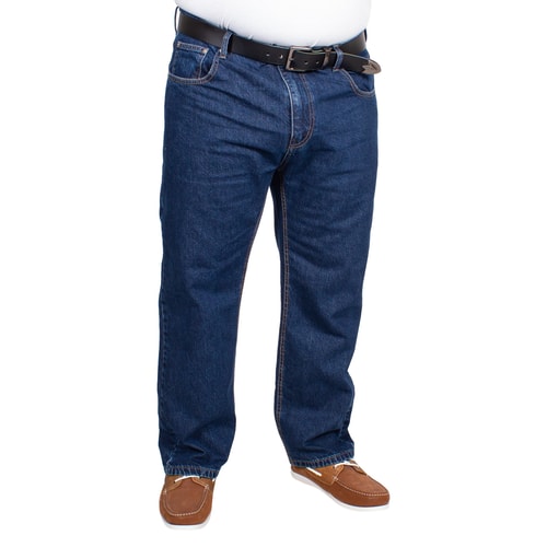 Alternate front view of blue denim jeans on model.