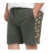 Thumbnail Green jogger shorts with camo side panel, worn view.