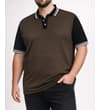 Thumbnail Brown and black polo shirt worn with black jeans.