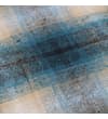 Thumbnail Close-up of chest pocket on turquoise checked flannel overshirt.